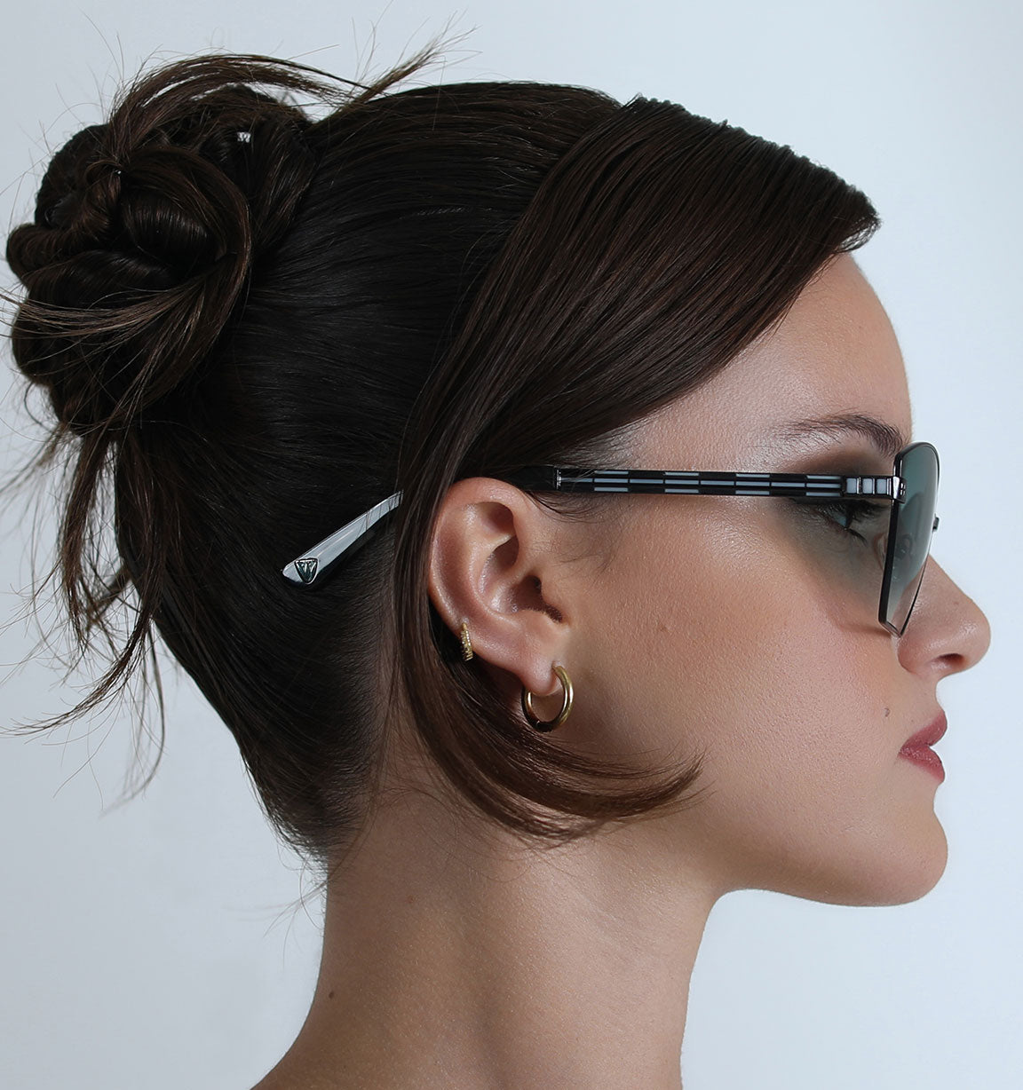 Lightweight titanium glasses, strong titanium sunglasses, sunglasses & optical, luxury eyewear, mazzucchelli italian acetate, made in japan, mythology, eyewear designer, woman owned small business, summer accessories, chic style, celebrity style, aviator glasses, d-frame eyewear, cat eye sunglasses, art deco, geometric art, black glasses, enamel detail