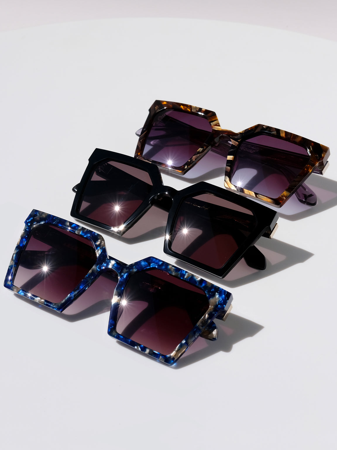 double down, luxury sunglasses, oversized square glasses, designer eyewear, blue glasses, black glasses, brown glasses, gemstone inspired eyewear, mythology, art deco, goddesses, woman owned business