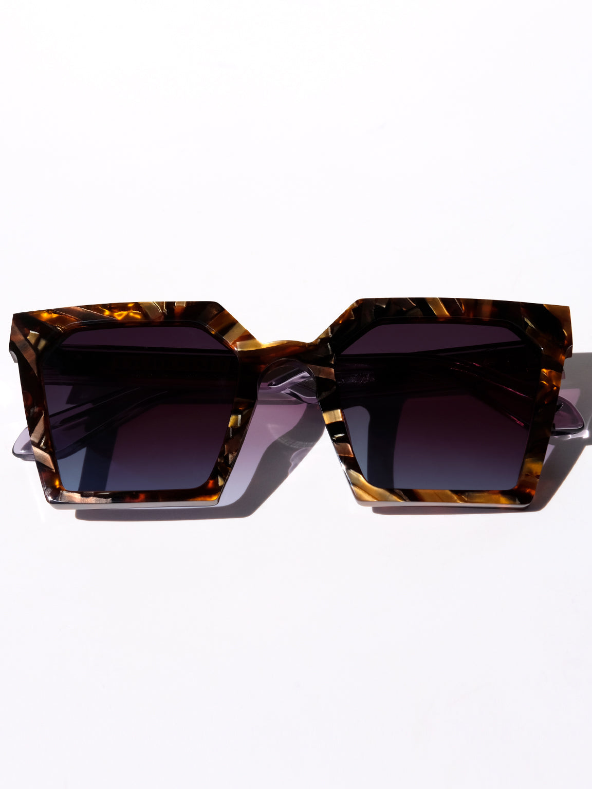 oversized brown striped square sunglasses, 70s vibes, viper, brown striped sunglasses, double down, luxury sunglasses, oversized square glasses, designer eyewear, blue glasses, black glasses, brown glasses, gemstone inspired eyewear, mythology, art deco, goddesses, woman owned business