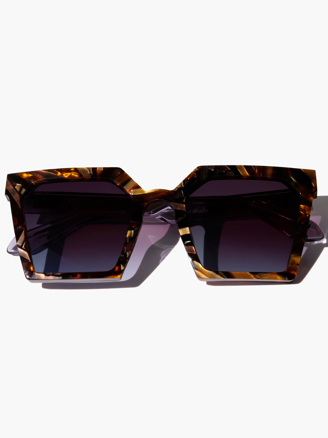 oversized brown striped square sunglasses, 70s vibes, viper, brown striped sunglasses, double down, luxury sunglasses, oversized square glasses, designer eyewear, blue glasses, black glasses, brown glasses, gemstone inspired eyewear, mythology, art deco, goddesses, woman owned business