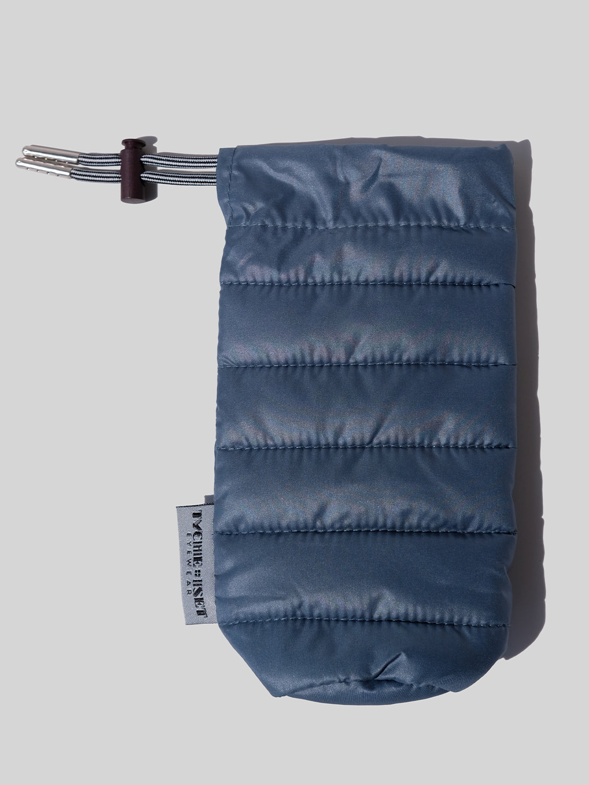 blue eyewear case, soft eyewear case, optical accessories, sunglass pouch sleeve, available in four colors, made from recycled materials, drawstring pouch for accessories, keys, makeup, phone, wallet, camera and more, travel essentials, luxury optical extras, unisex, organize items, protect from scratches and dust, outdoor activities