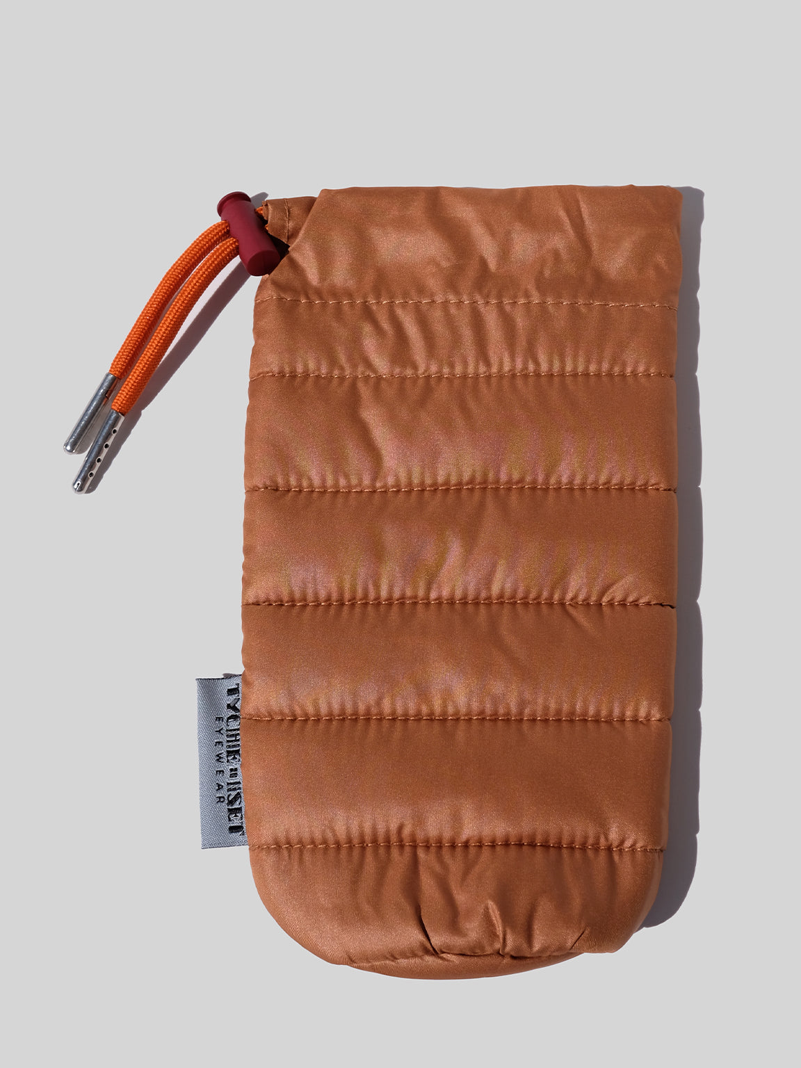 copper eyewear case, soft eyewear case, optical accessories, sunglass pouch sleeve, available in four colors, made from recycled materials, drawstring pouch for accessories, keys, makeup, phone, wallet, camera and more, travel essentials, luxury optical extras, unisex, organize items, protect from scratches and dust, outdoor activities