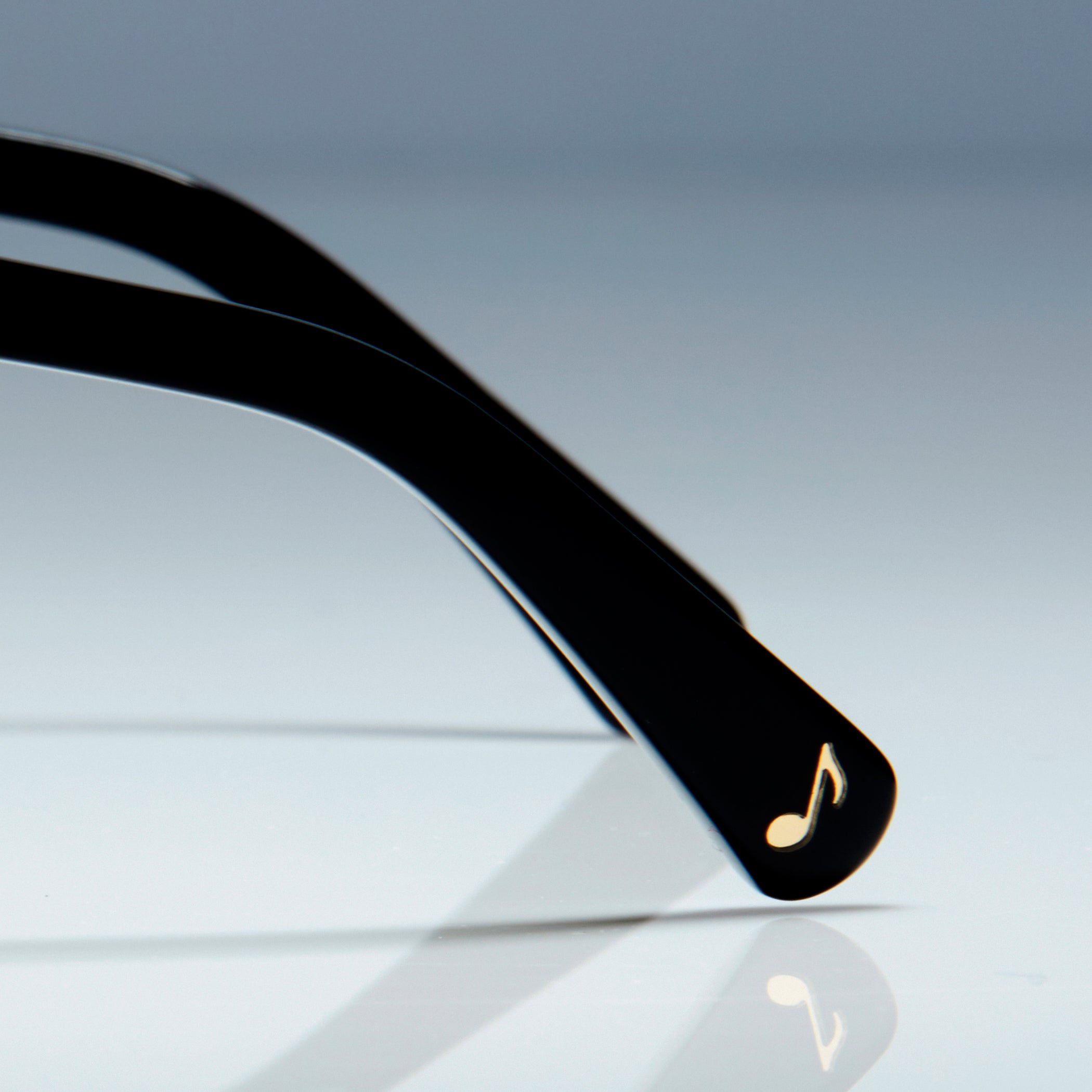 MUSIC NOTE TEMPLE DETAIL. OVERSIZED BLACK CAT EYE SUNGLASSES, GOLD METAL DETAILS. GREY GRADIENT LENS. ART DECO DESIGN, LIMITED EDITION. DESIGNER EYEWEAR, LUXURY SUNGLASSES. CELEBRITY SUNGLASSES. FEMALE ENTREPRENEUR. plus size fashion