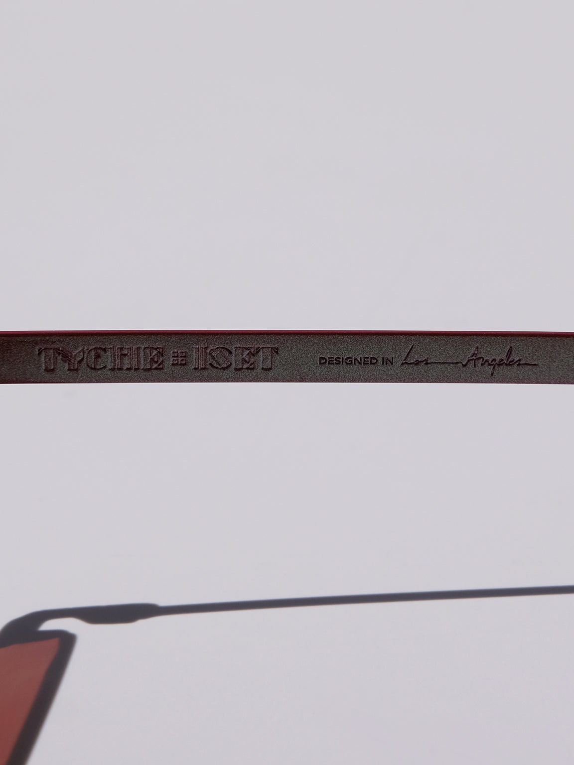 Lightweight titanium glasses, strong titanium sunglasses, sunglasses & optical, luxury eyewear, mazzucchelli italian acetate, made in japan, mythology, eyewear designer, woman owned small business, summer accessories, chic style, celebrity style, aviator glasses, d-frame eyewear, cat eye sunglasses, art deco, geometric art, red glasses, maroon sunglassesl