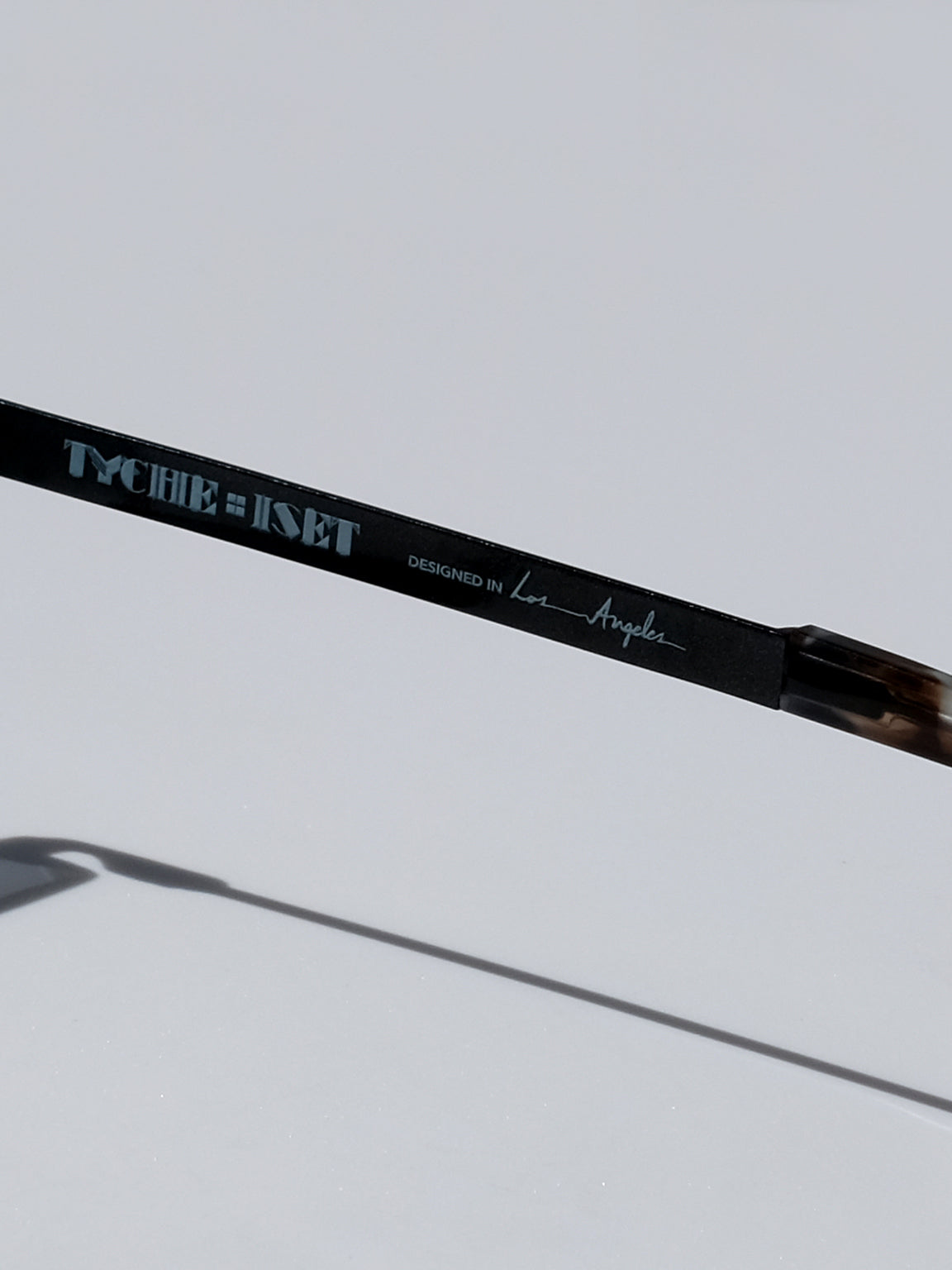 Lightweight titanium glasses, strong titanium sunglasses, sunglasses & optical, luxury eyewear, mazzucchelli italian acetate, made in japan, mythology, eyewear designer, woman owned small business, summer accessories, chic style, celebrity style, aviator glasses, d-frame eyewear, cat eye sunglasses, art deco, geometric art, black glasses