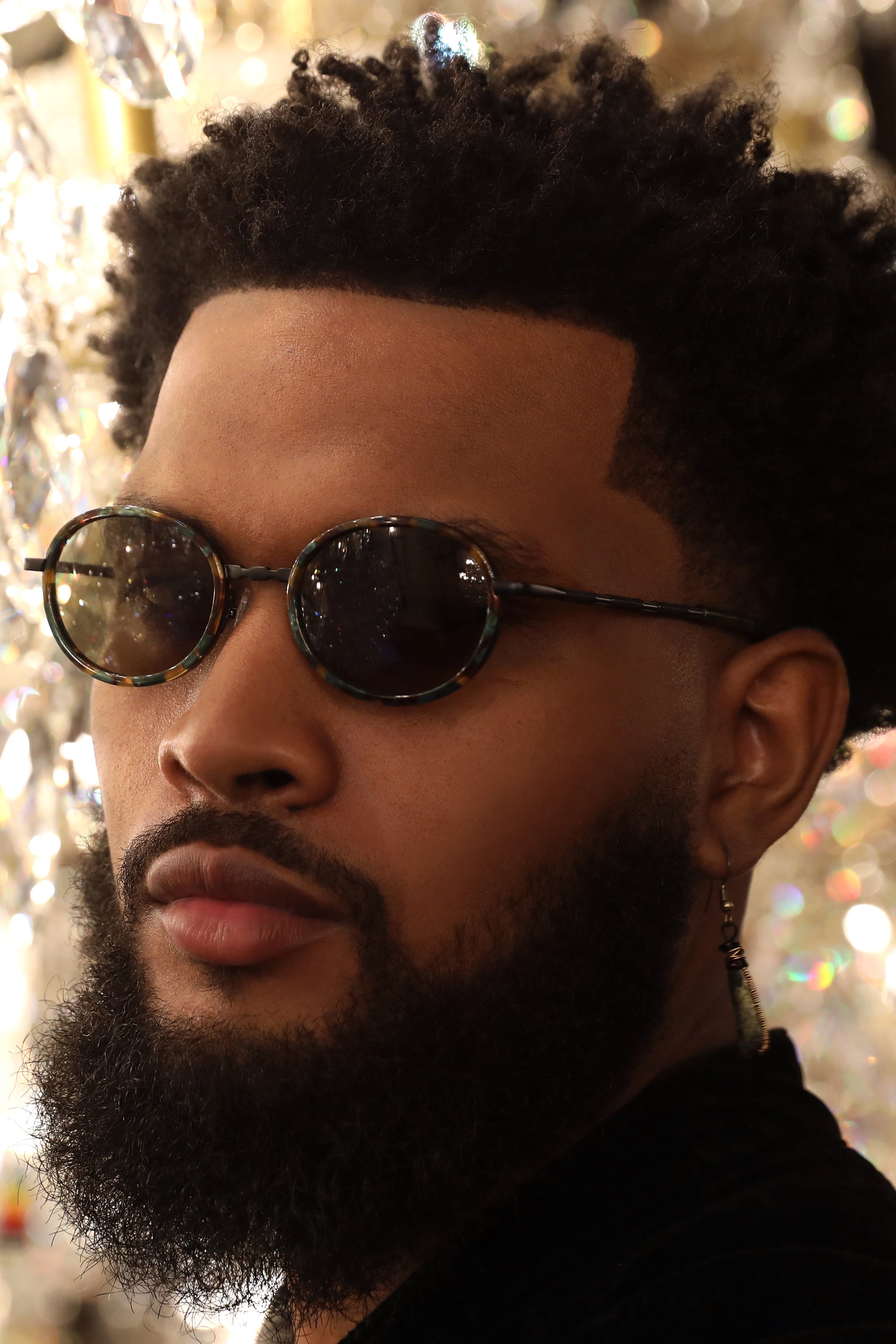 MATTE BLACK CLASSIC UNISEX OVAL SUNGLASSES, MATTE BLACK METAL DETAILS. OLIVE GREEN LENS. ART DECO DESIGN, LIMITED EDITION. DESIGNER EYEWEAR, LUXURY SUNGLASSES. CELEBRITY SUNGLASSES. FEMALE ENTREPRENEUR.