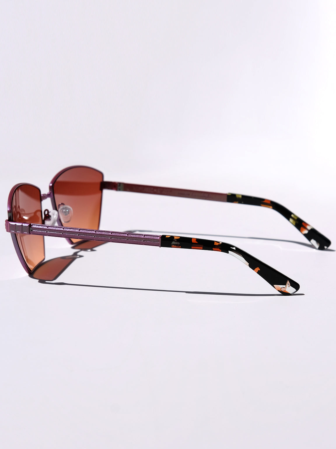 Lightweight titanium glasses, strong titanium sunglasses, sunglasses & optical, luxury eyewear, mazzucchelli italian acetate, made in japan, mythology, eyewear designer, woman owned small business, summer accessories, chic style, celebrity style, aviator glasses, d-frame eyewear, cat eye sunglasses, art deco, geometric art, red glasses, maroon sunglasses