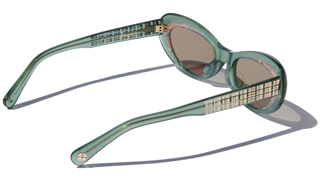 LIGHT GREEN AND PINK CLASSIC CAT EYE SUNGLASSES, GOLD METAL DETAILS. BROWN LENS. ART DECO DESIGN, LIMITED EDITION. DESIGNER EYEWEAR, LUXURY SUNGLASSES. CELEBRITY SUNGLASSES. FEMALE ENTREPRENEUR.