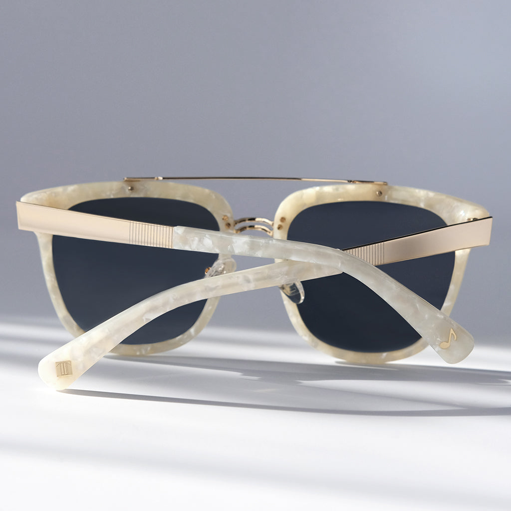 PEARL WHITE CLASSIC UNISEX ROUND SUNGLASSES, GOLD METAL DETAILS. GOLD MIRROR LENS. ART DECO DESIGN, LIMITED EDITION. DESIGNER EYEWEAR, LUXURY SUNGLASSES. CELEBRITY SUNGLASSES. FEMALE ENTREPRENEUR.