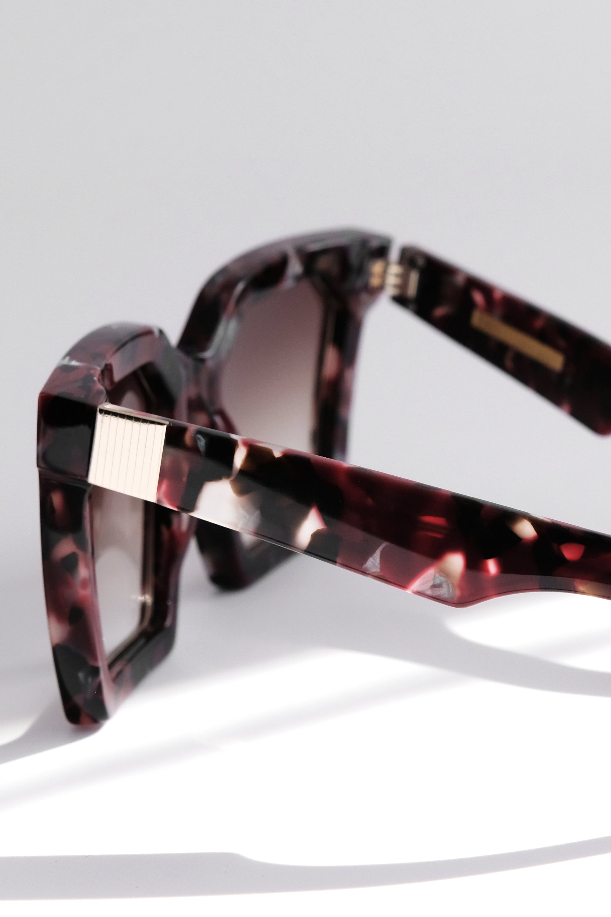 RED MAROON OVERSIZED SQUARE UNISEX SUNGLASSES, GOLD METAL DETAILS. BROWN GRADIENT LENS. ART DECO DESIGN, LIMITED EDITION. DESIGNER EYEWEAR, LUXURY SUNGLASSES. CELEBRITY SUNGLASSES. FEMALE ENTREPRENEUR.